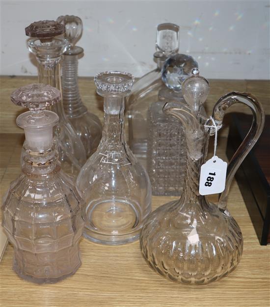 Six decanters and a ewer